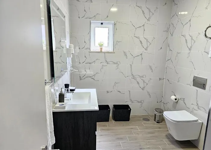 Curtido House Suits 招待所 伊利亚武